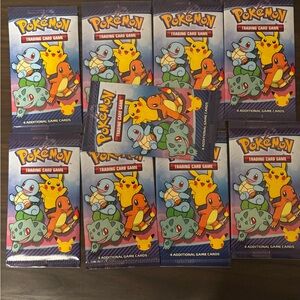9 sealed Pokemon 25th Anniversary Packs